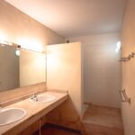 shower room with double sink