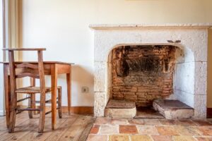 period fireplace in the third double room on the second floor