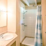 shower and sink in the bathroom